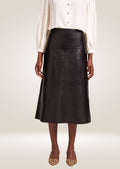 Classic black leather midi skirt with fitted waist and polished soft leather texture