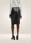 Classic black leather pencil skirt featuring refined stitching and sophisticated design