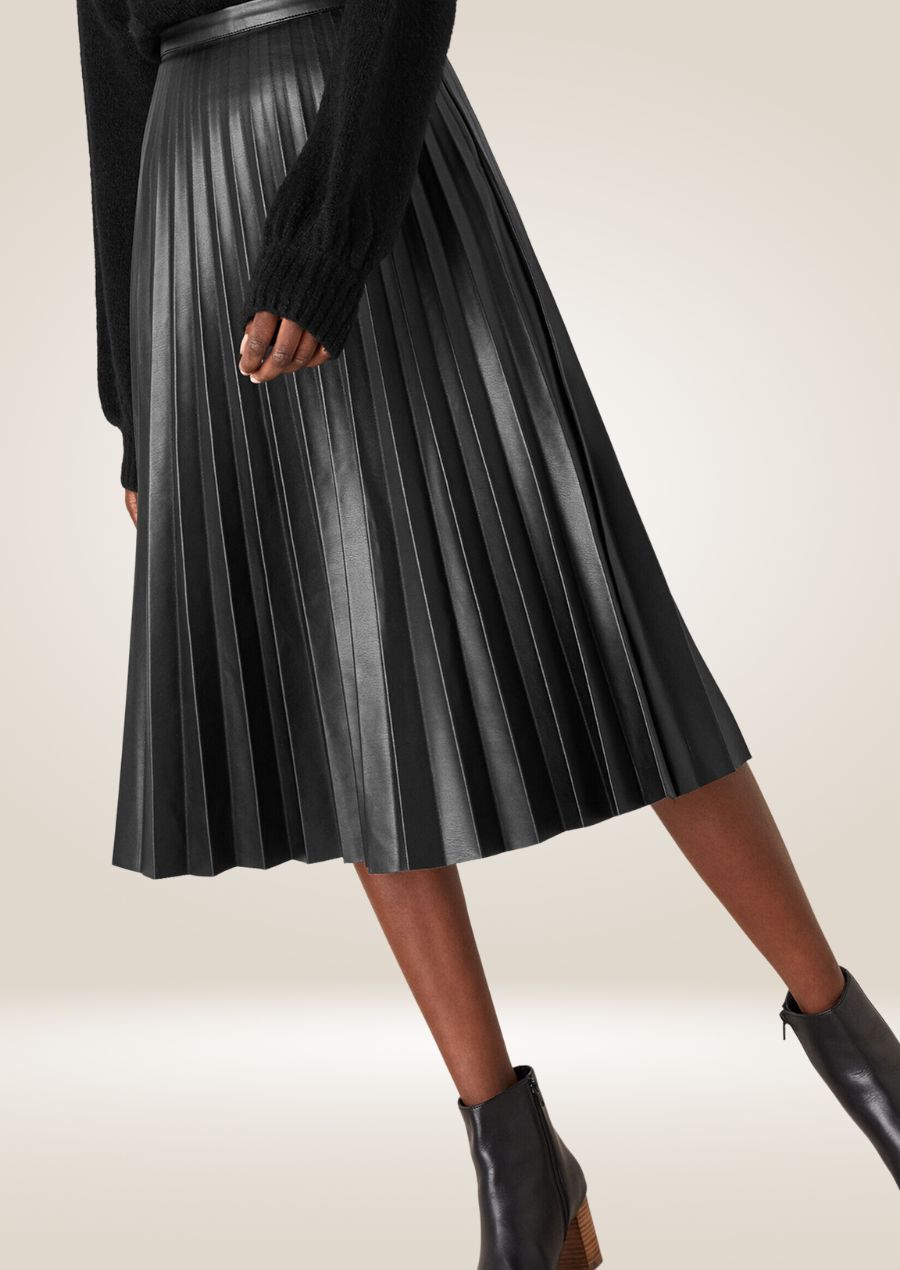 Black pleated leather midi skirt with elegant flowy design and refined structured pleats