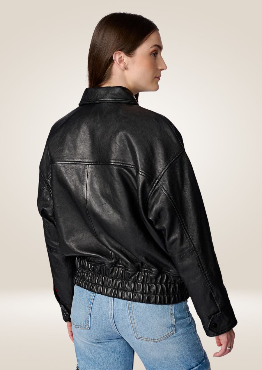 Classic women’s black leather bomber jacket with ribbed cuffs