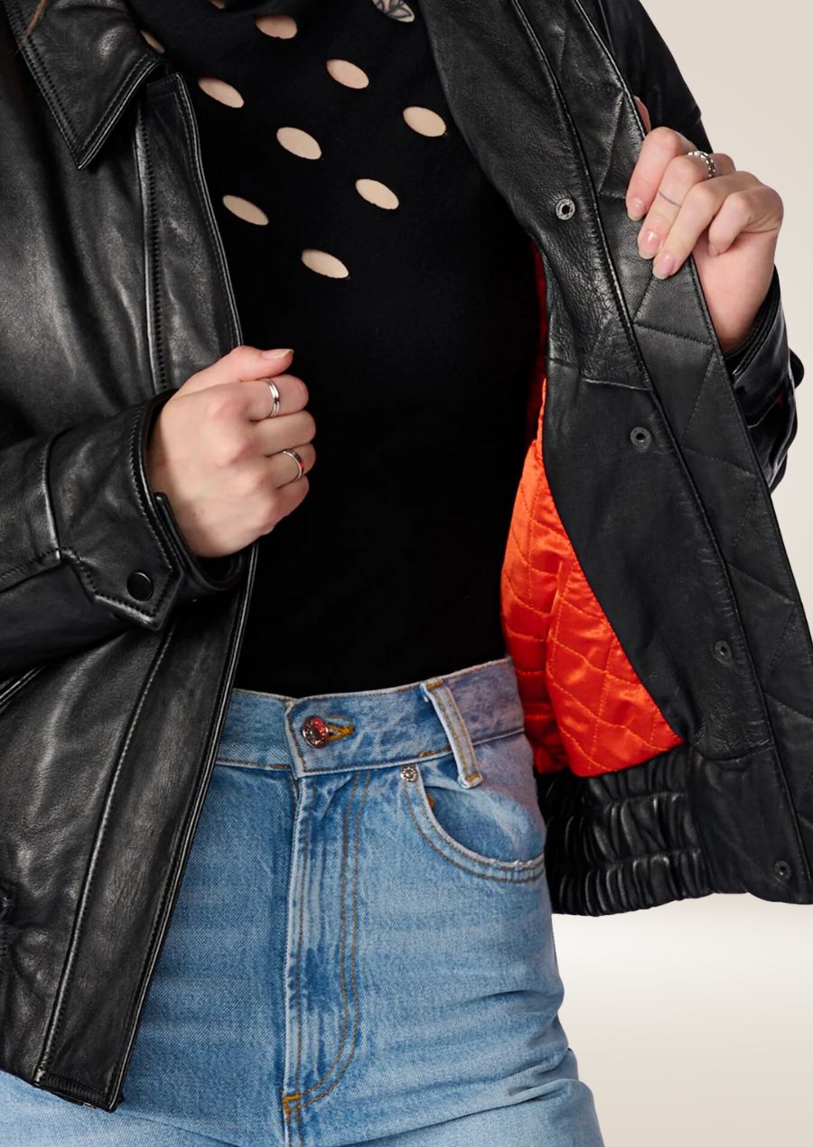 Loose-fit black leather bomber jacket for women with pockets