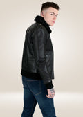 Stylish black leather aviator jacket featuring soft shearling trim