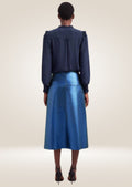 Stylish metallic blue leather midi skirt featuring smooth texture and modern tailored fit