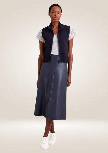 Navy leather midi skirt with high waist and sleek tailored silhouette for modern styling