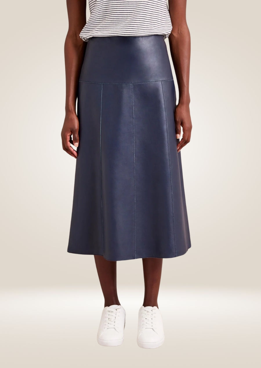 Navy leather midi skirt with high waist and sleek tailored silhouette for modern styling