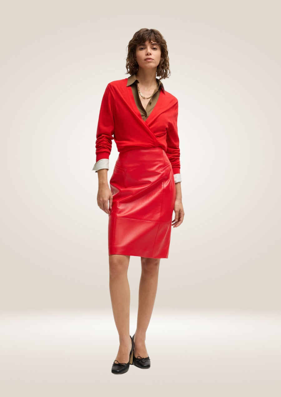 Red leather pencil skirt with high waist and sleek body-hugging tailored silhouette