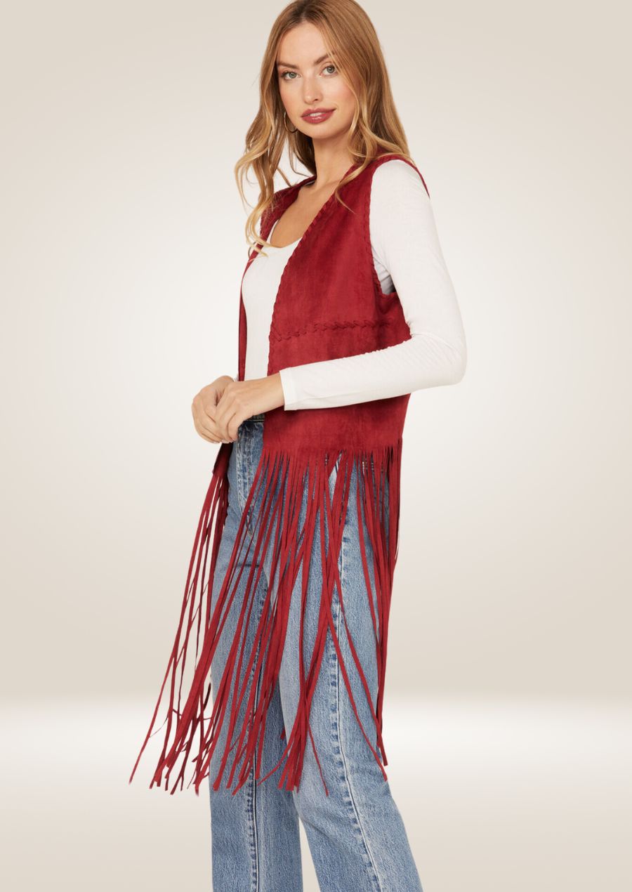 Red long leather fringe vest featuring extended tassels and classic western-inspired design