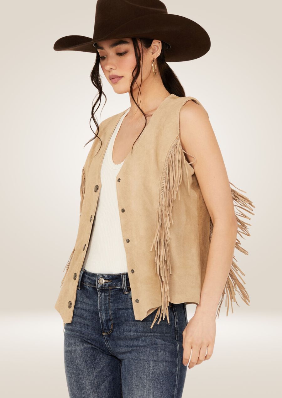 Tan leather western fringe vest featuring long tassels and classic sleeveless design