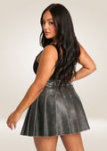 Stylish vintage leather mini skirt with subtle distressed finish and tailored short cut