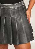 Vintage leather mini skirt offering structured fit and retro-inspired casual chic design