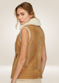 Elegant brown sheepskin shearling vest offering warmth, comfort, and timeless outerwear style