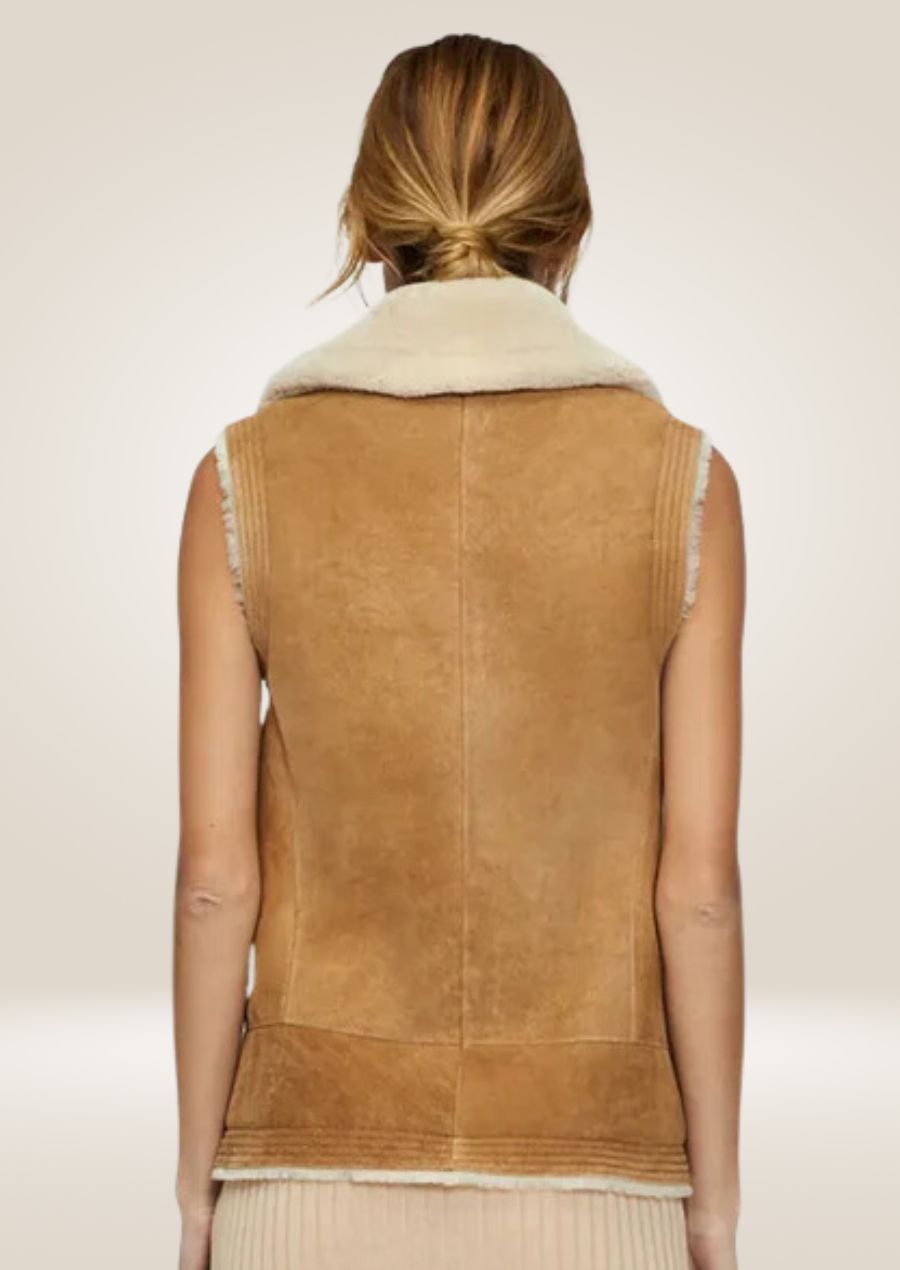 Premium women’s brown shearling leather vest with smooth exterior and soft inner lining