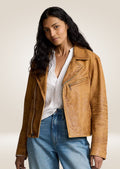 Stylish women’s brown waxed leather jacket featuring soft lambskin and durable texture