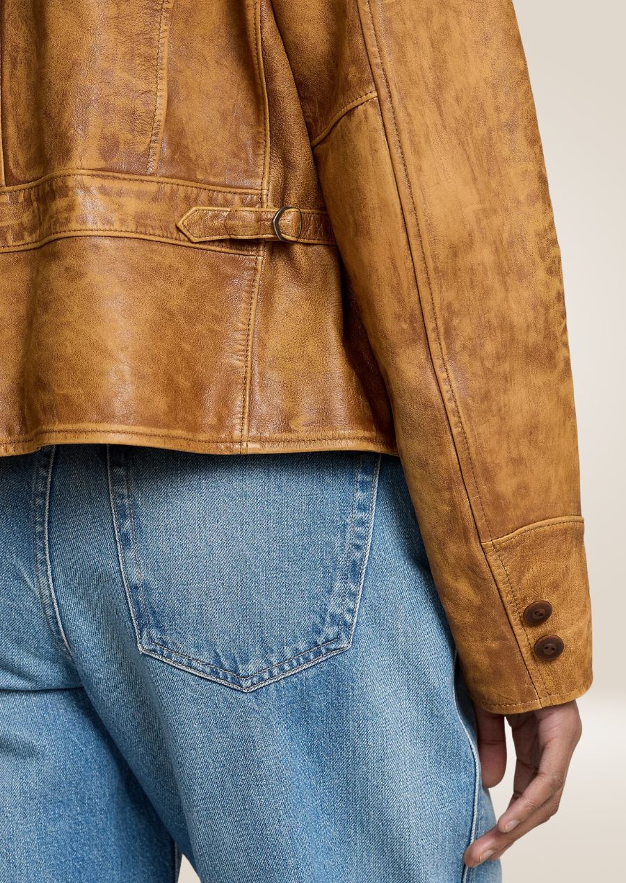 Women’s brown waxed leather jacket designed for casual and versatile everyday wear